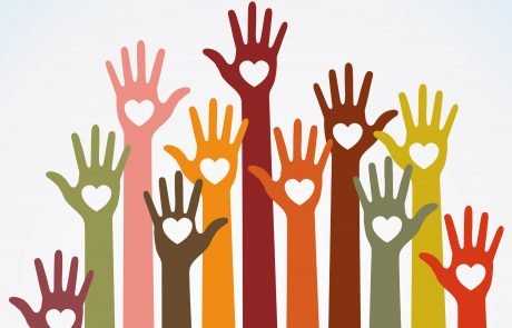 Hands raised with hearts in palms
