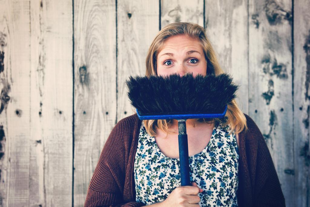 sweeping with a broom